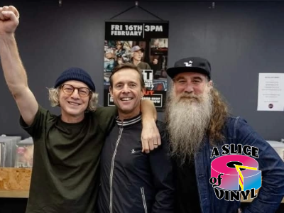 CAST BAND posing together with a 'A Slice of Vinyl' logo in the background